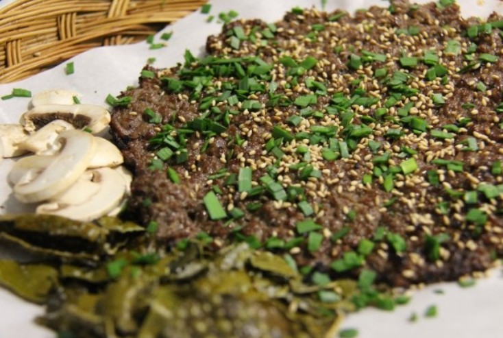 Bassak bulgogi — finely chopped seasoned beef pressed thin and grilled until crisp