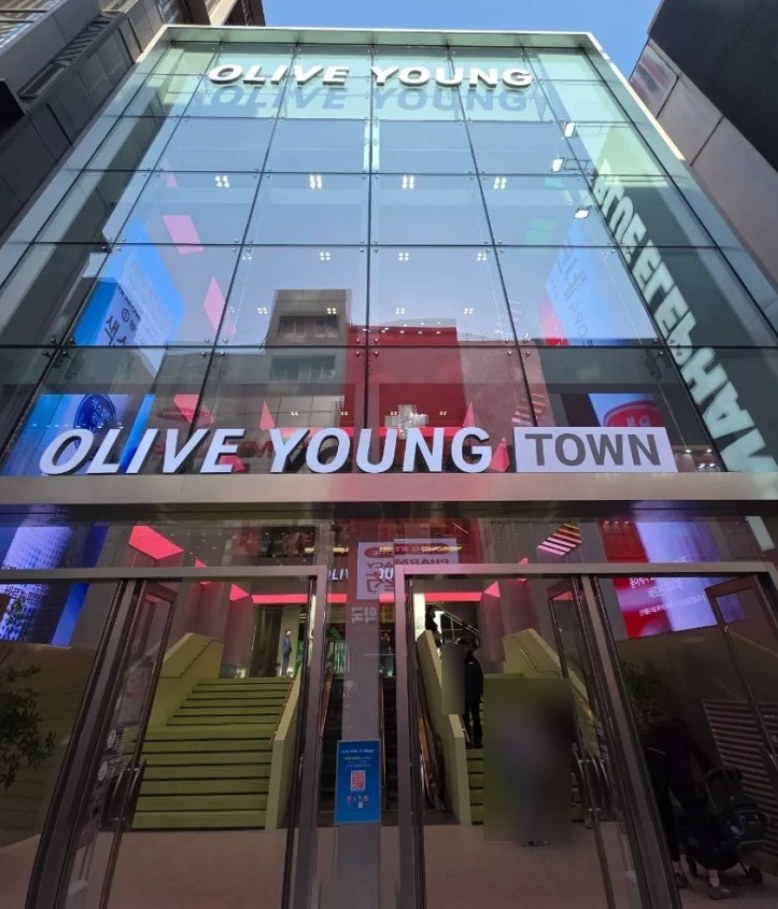 Olive Young Town glass storefront; the exact branch has not been independently confirmed.