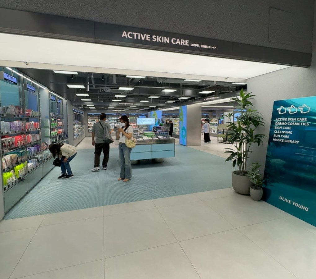 Olive Young active skincare section and product displays.