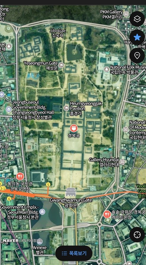 Naver Map showing subway exit numbers and route steps in English on a phone